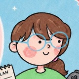 Lilly, with a brown ponytail and round blue glasses.